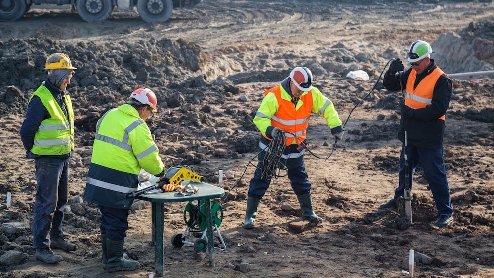 Archaeologists dig in the ground | GPR Compared to Other Geophysical Methods | US Radar